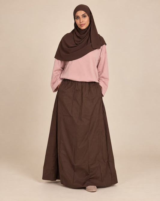 Haut oversize rose poudré à épaules tombantes, vue de face – Kiswa Collection